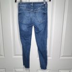 Free People  | Button Fly Skinny Jeans with Distressed Hem Photo 14
