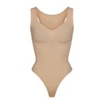 SKIMS  Seamless Sculpt Scoop Neck Thong Bodysuit In Clay Photo 1