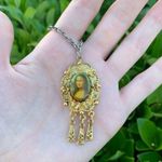 Vintage Retro Gold Color Mona Lisa Portrait Painting Necklace w/ Silver Chain Photo 1