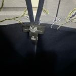 AGB navy dress with sheer floral details at neck and sleeves. Size 10 Photo 3