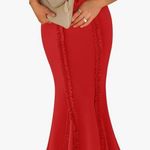 Elegant Red Strapless Dress with Black Bow Accents Photo 0