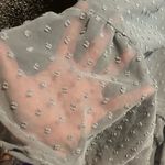 Altar'd State flowy, A-line maxi dress with a tiered skirt and a deep V-neckline or open-back design. Photo 5