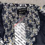 Urban Outfitters  Black motif romper dress in floral Photo 2