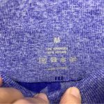 NVGTN Women's Vibrant Purple Camo Leggings Photo 1