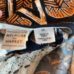 Melrose and Market  boho peplum tank w/tribal print, crochet details & chest cutout Photo 6