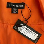 Pretty‎ Little Thing NWT Orange Ruffle Hem Mini Skirt Womens Size 12 Photo 1