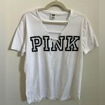 PINK - Victoria's Secret PINK Victoria’s Secret white shirt with cut out on chest Photo 0