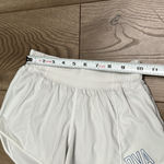 Lululemon  Hotty Hot Short‎ 4" White Running Shorts OVA Logo Size 2 Tall Photo 6