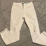 white ripped skinny jeans Size L Photo 0