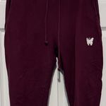 ASOS Good For Nothing skinny sweatpants
in burgundy size medium Photo 0