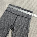 Athleta Ultimate Linear Lines Capri Leggings Women's XS Black White Pockets Photo 7