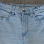 American Eagle  Outfitters next level stretch hi-rise jegging denim jeans in light wash blue size 4 short. Photo 2