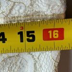 Jenny Yoo Collection Lace Mini Dress in white/gold in size 12. Photo 10