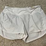 Lululemon  white mid rise speed up shorts 4” size 10 Photo 3