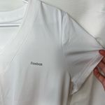 Reebok NWOT women’s solid white v-neck active athletic short sleeve shirt large Photo 1