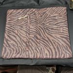 Diane Von Furstenberg  Animal Print Clutch
“Philomena” Photo 1