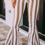 These Three Boutique Striped Denim Flares Photo 3