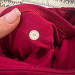 Lululemon  ruby red‎ reveal tight interconnect 25.5”leggings size 10 Photo 4