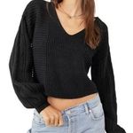Free People  When It Rains V-Neck Knit Sweater in Black Photo 0