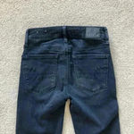 American Eagle  high rise distressed black jegging jeans in size 00 Photo 3
