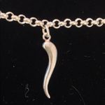 Sterling silver and peridot lucky charm bracelet. Photo 4