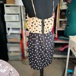 Peppermint Two-tone polka dot dress:
Elegant dress with a strappy design Photo 2