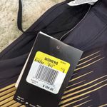 Nike  Black Leggings with Gold Accents Photo 2