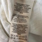 Free People  ladies tank top is a size TP/XS. Photo 2