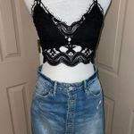 Indigo Rein  medium/light was distressed button front denim mini skirt. Photo 1