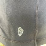 Ellie  Black fitted built in bra crisscross straps athletic tank Photo 2