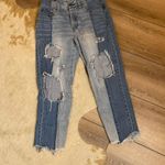 American Eagle  Vintage Hi-Rise Two Tone Raw Hem Distressed Jeans  Photo 0