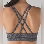 Lululemon  Energy Bra Criss Cross Back Power Luxtreme Ripple Jacquard Black White Photo 1