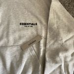 Fear of god ESSENTIALS FEAR OG GOD LIGHT OATMEAL PULLOVER HOODIE SIZE XS Photo 1