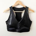 Fabletics | On the Go Midi Sports Bra Faux Leather Look Back Cutout | Large Photo 1