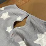 Storia  medium v-neck grey romper white embroidered starts ruffle batwing sleeves Photo 10