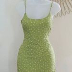 LA Hearts PACSUN L.A. HEARTS Olive green cami spaghetti strap polka dot with stars mini slip on dress with lace up tie strap back detail  Photo 0