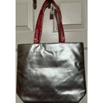 Clinique  Women's Silver Tote Bag Peppermint Swirl Pattern Inside Tote Red Handle Photo 1