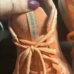 Brooks Ghost Max running shoes in a Papaya/Apricot/Blue Women’s 9B Photo 4