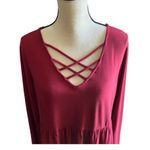 Torrid stunning red babydoll top, long sleeves, super soft, excellent condition, size 2x Measurements: Bust: armpit to armpit 21 inches Length: shoulder seam to bottom Front: 29 inches Back: 32 inches Photo 1