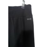 Calvin Klein Black Plain Stretchy Athletic Flared Yoga Pants Photo 1