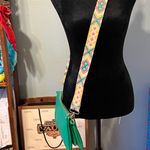 Green Crossbody Bag with Patterned Strap Photo 1
