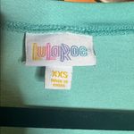 LuLaRoe  Iris Aqua Blue V-Neck Short Sleeve Tunic Top Size XXS Oversized Photo 1