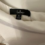 Lulus Enticing Behavior White Ruffled One Photo 3