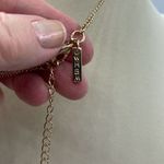 White House | Black Market WHBM “L” dangle rhinestone gold colored choker . Photo 3