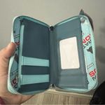 Lounge Fly  Disney Pixar Moments Incredibles Syndrome Zip Around Wallet NWT Photo 3