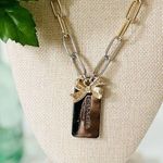 Coach  Gold Bow and Silver Hangtag Necklace Photo 1