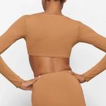 SKIMS  NWOT Signature Swim Long Sleeve Shrug Size XS Photo 1