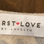 Leopard print tank top. Size medium. Tie at bottom. Photo 1