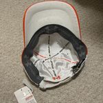 Under Armour  White Cap with Red Accents Photo 1