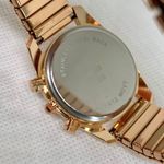 Women rose gold tone watch 32mm quartz analog stretch band size 7” running Photo 5